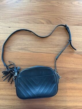 Black Quilted Crossbody Bag with Tassel Detail